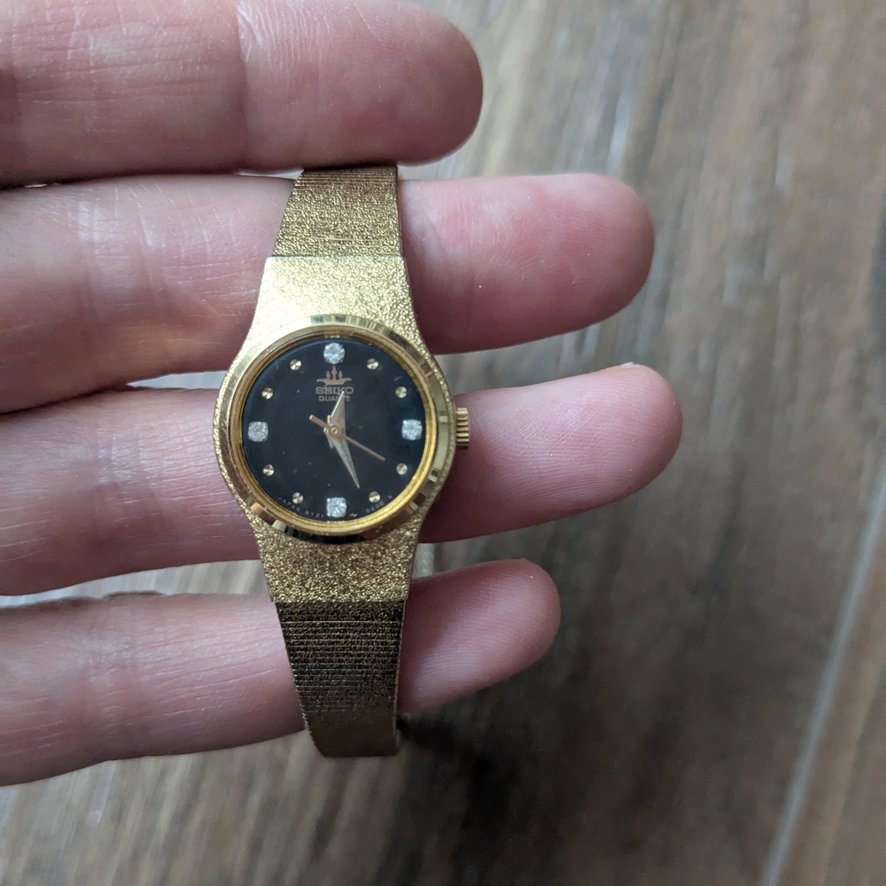 Gold and Black Watch with Diamond Accents